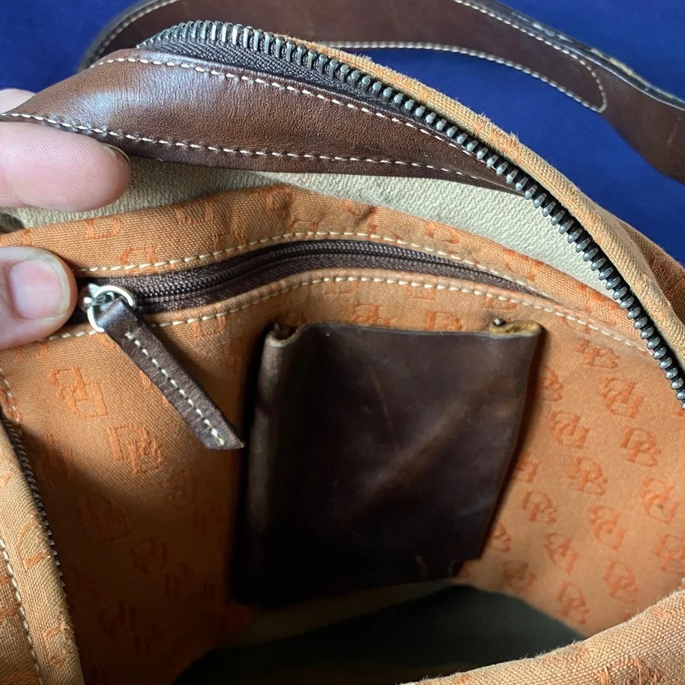 Dooney & Bourke Vintage burnt Orange over the shoulder bucket Bag